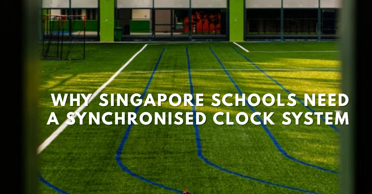 synchronised clock system installed in a Singapore school corridor all displays showing the same time for MOE and SCDF compliance